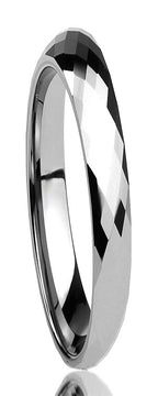Silver ring with a reflective surface on a white background