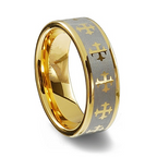 Gold and silver ring with engraved cross symbols on a white background