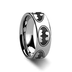 Silver ring with Batman logo design on a white background