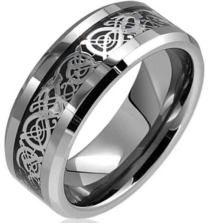 Silver ring with intricate Celtic knot design on a white background