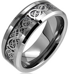 Silver ring with intricate Celtic knot design on a white background