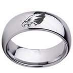Silver ring with an eagle emblem on a white background