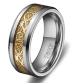 Tungsten carbide ring with gold inlay on a white background