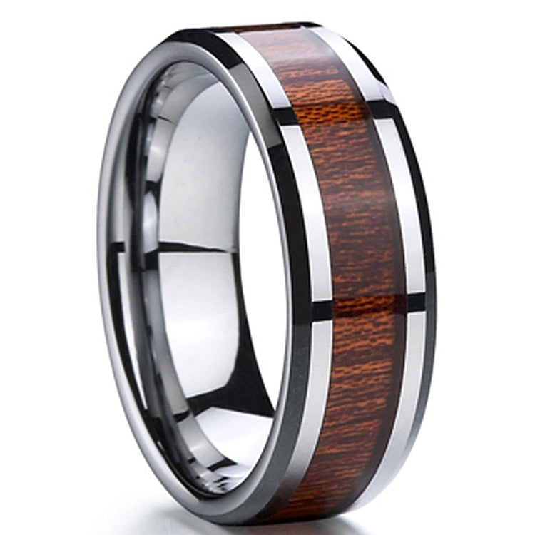 Ring with wooden inlay on a reflective surface